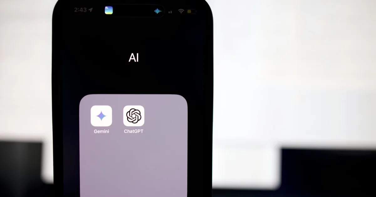 A smartphone showing an app folder labeled AI containing the Gemini and ChatGPT apps