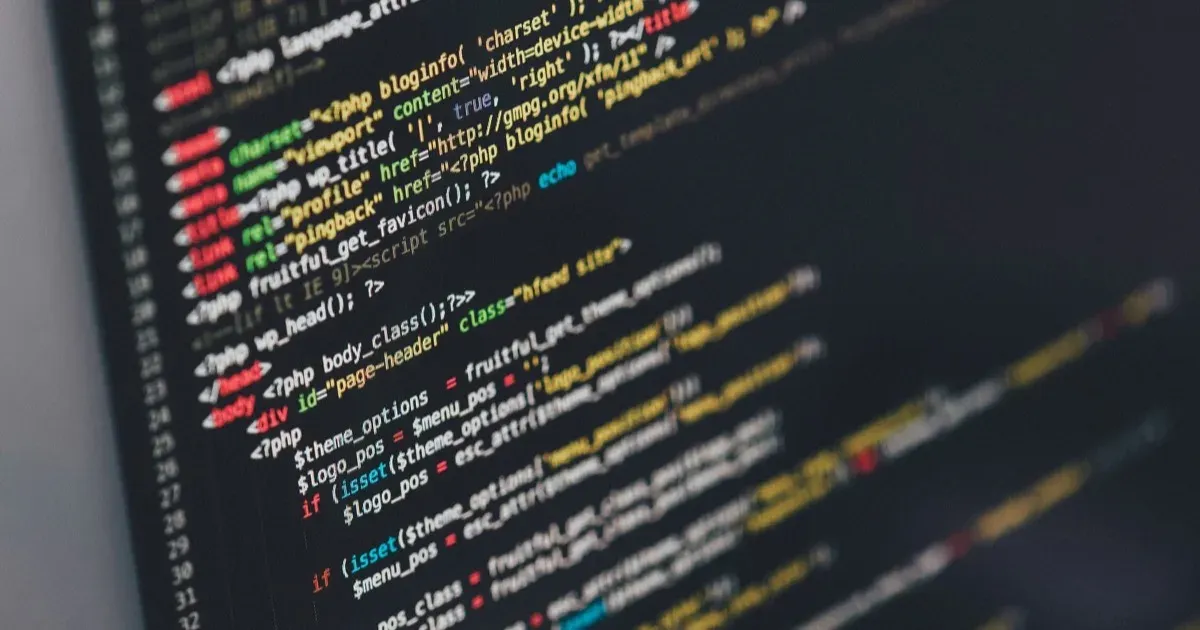 Website source code displayed on a computer monitor